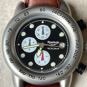 REEBOK men battery leather band stainless steel water resistant 100m w/date